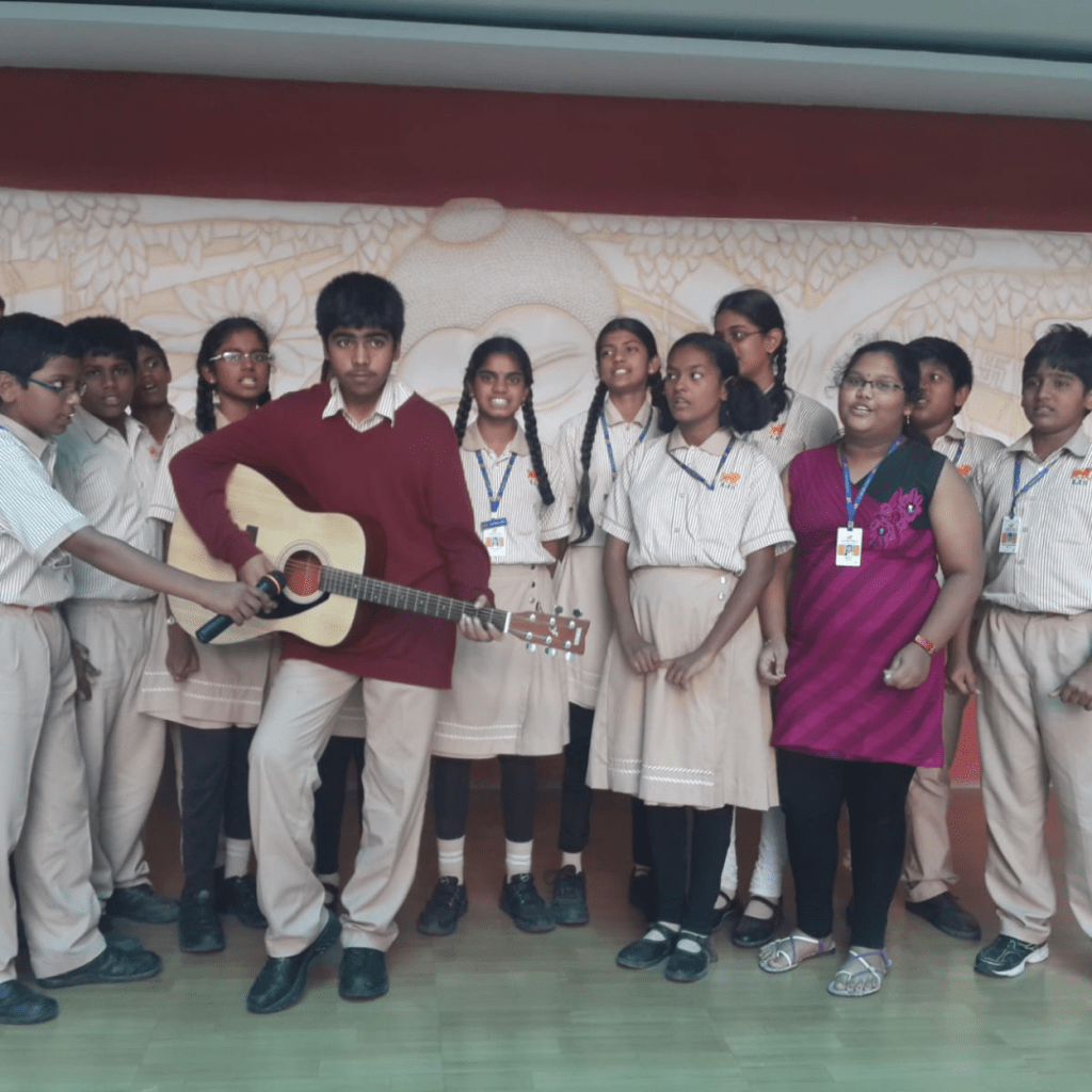 student playing guitar