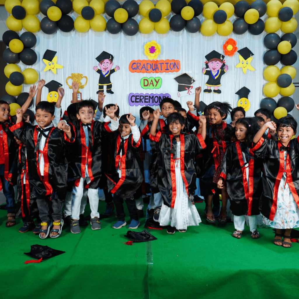 Students celebrating their graduation on stage