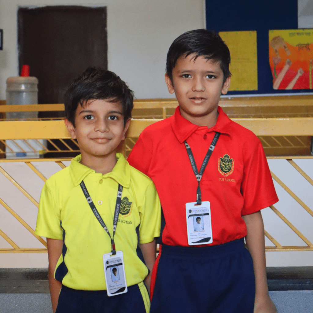 Students wearing different colored school uniforms