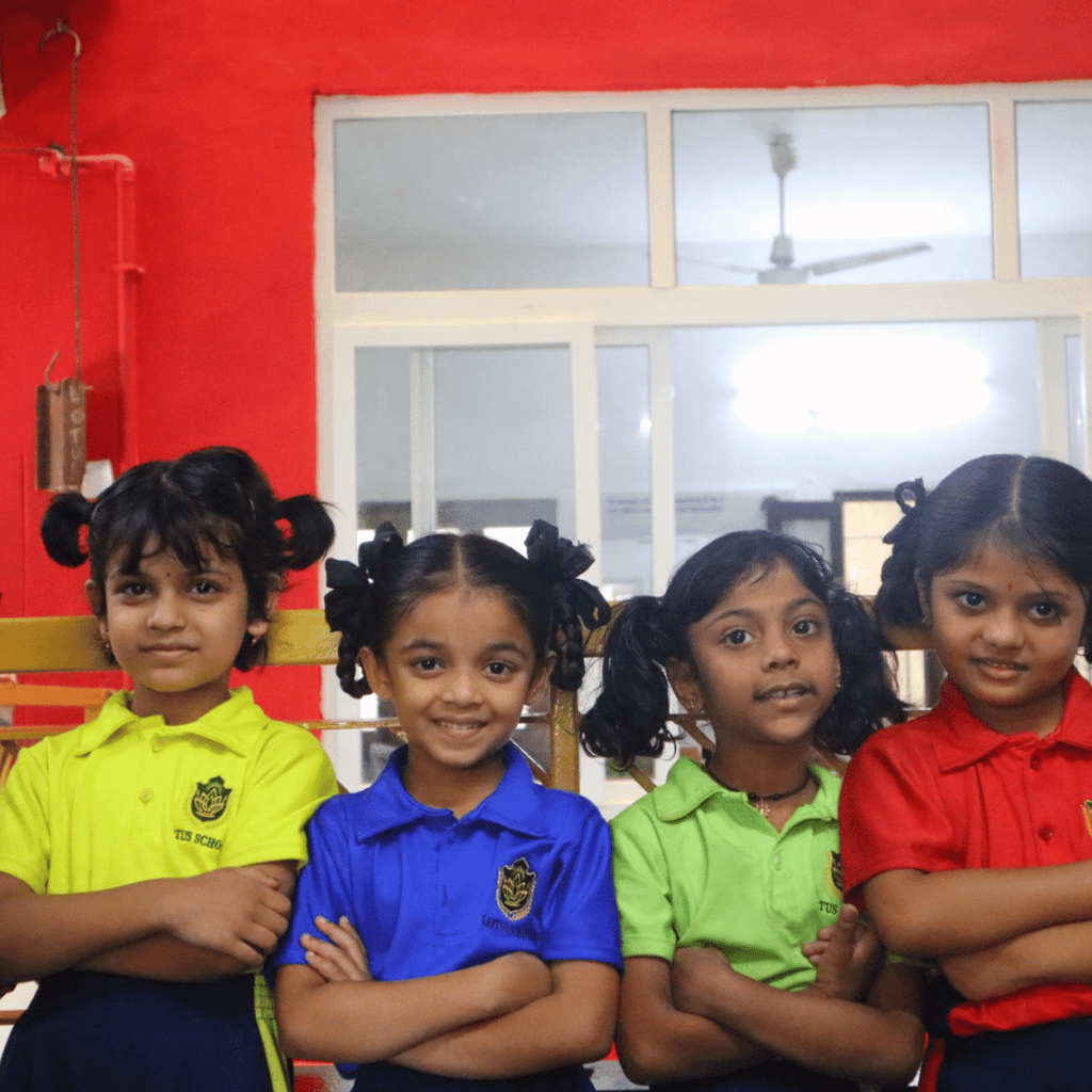 Children wearing different school uniforms