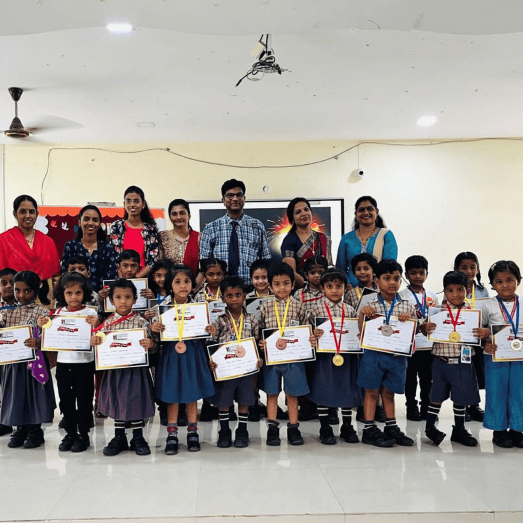 Children with teachers in a school learning environment